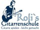 Roli: Ein kreativer Gitarrenlehrer mit eigener Gitarrenschule in der Zentralschweiz 